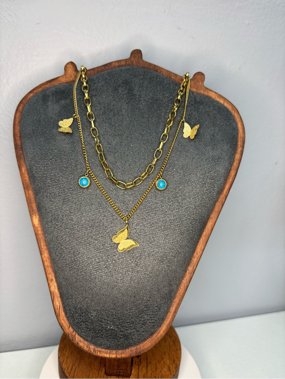 Gold Butterfly Layered Necklace with Turquoise Charm Accents
